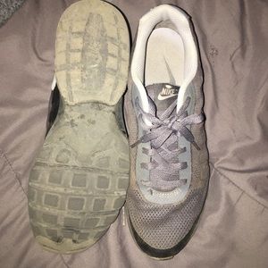 grey and black nike’s